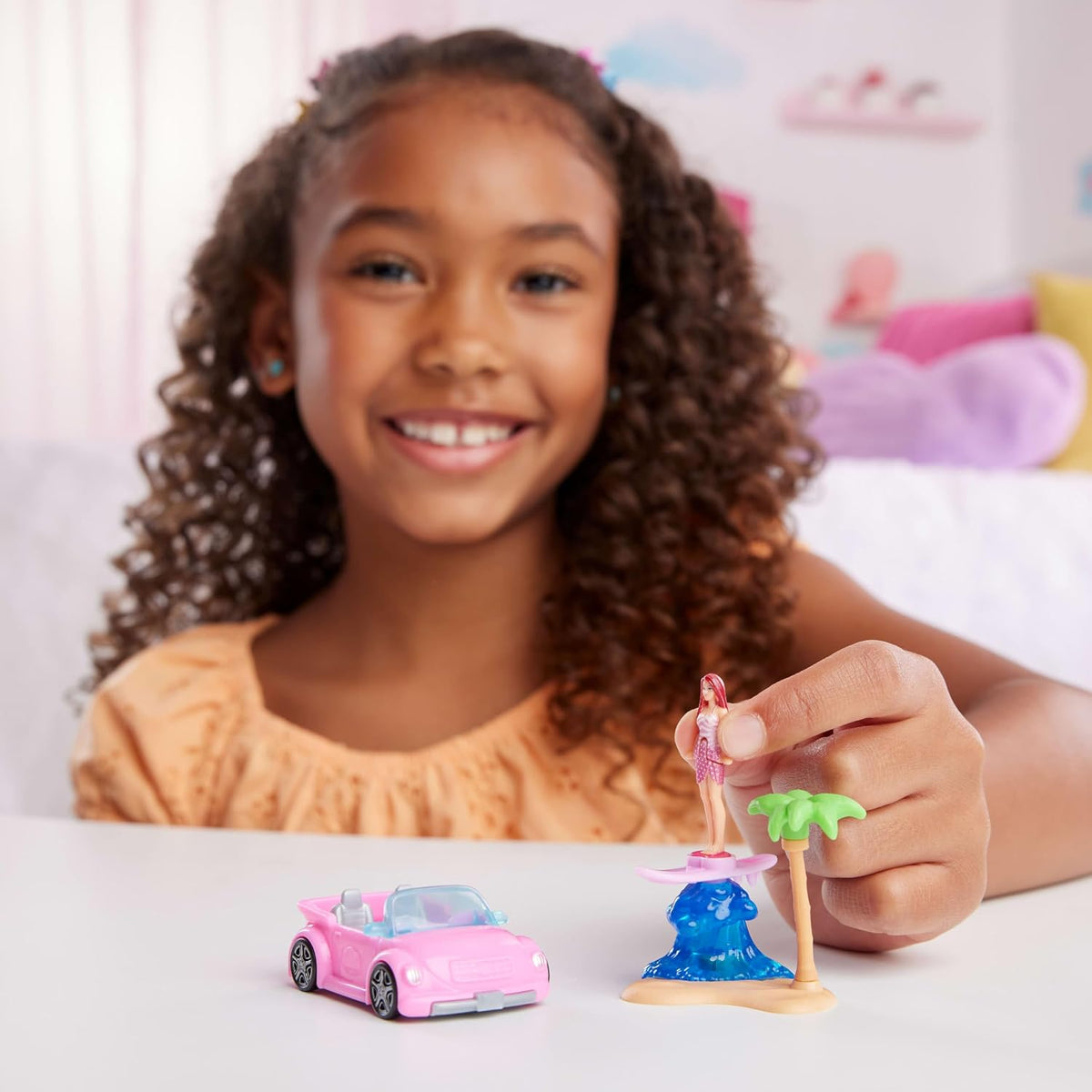Barbie Mini BarbieLand Doll & Toy Vehicle Set, 1.5-inch Barbie Doll & Beach Convertible with Color-Change, Plus Beach Ac